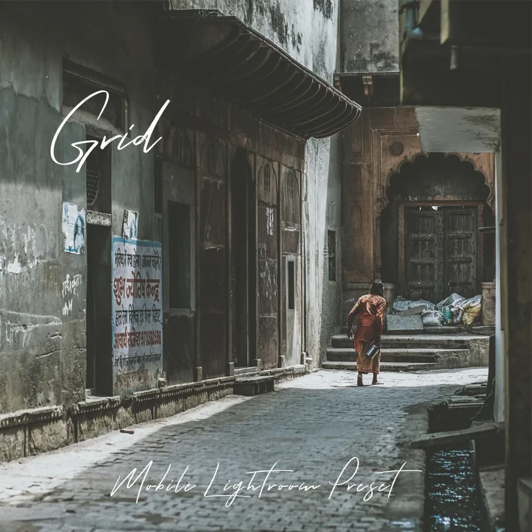 Old man walking down an empty street.