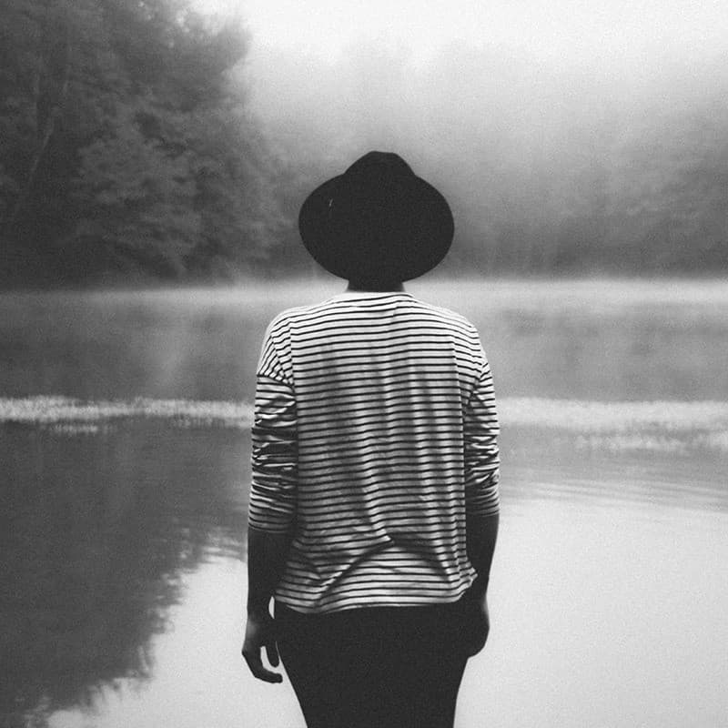 Woman looking at lake.