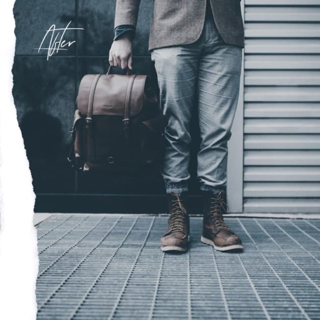 Man standing with brown boots and backpack.