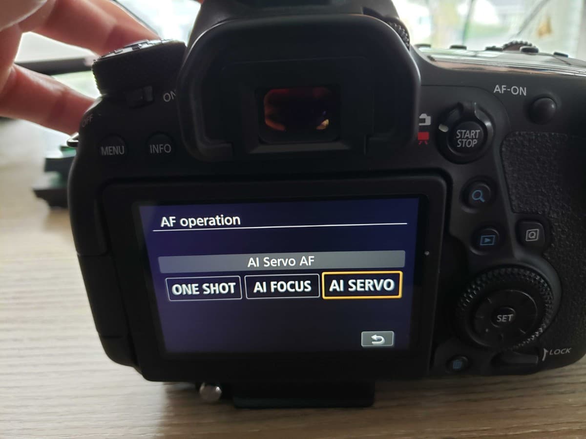 Continuous autofocus mode on the back of a camera.