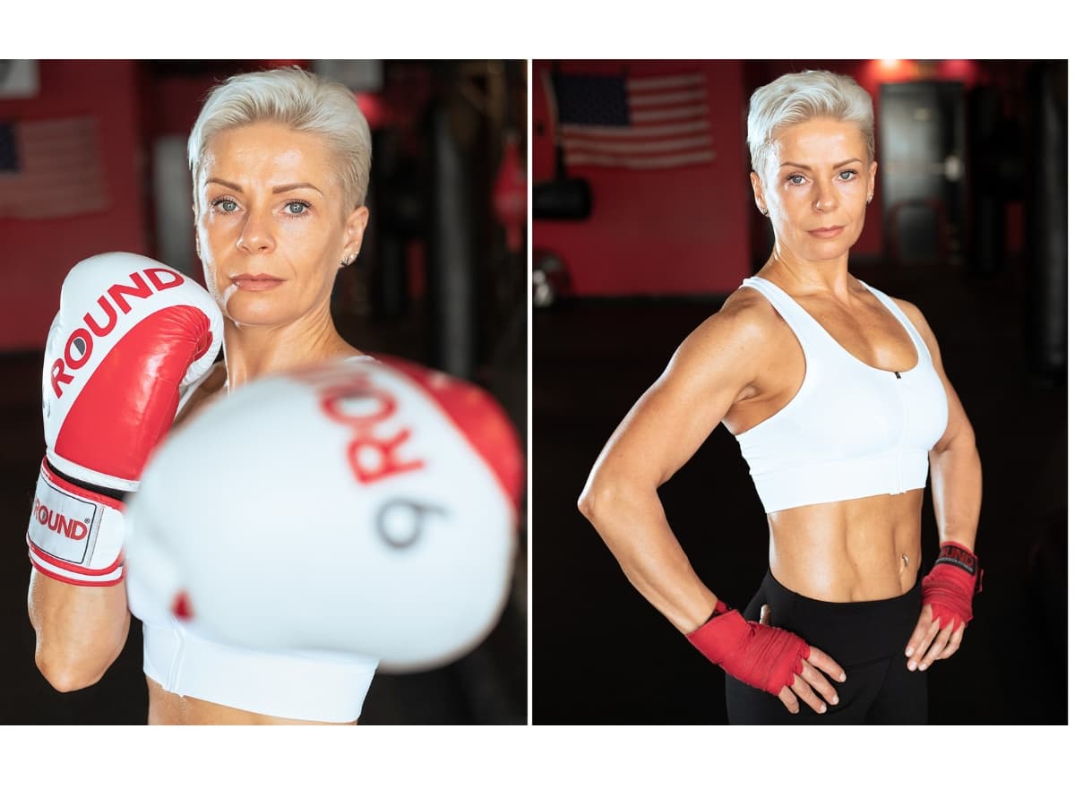 Woman posing in boxing attire.
