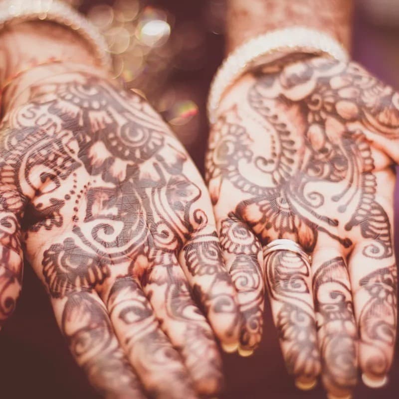 Henna tattooed hands.
