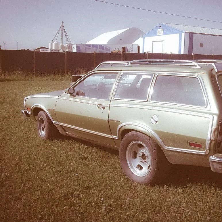 Old car on grass.