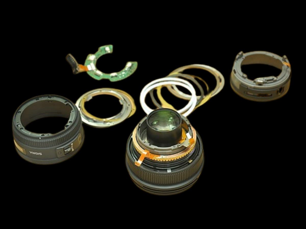 Internal lens motor on black background.