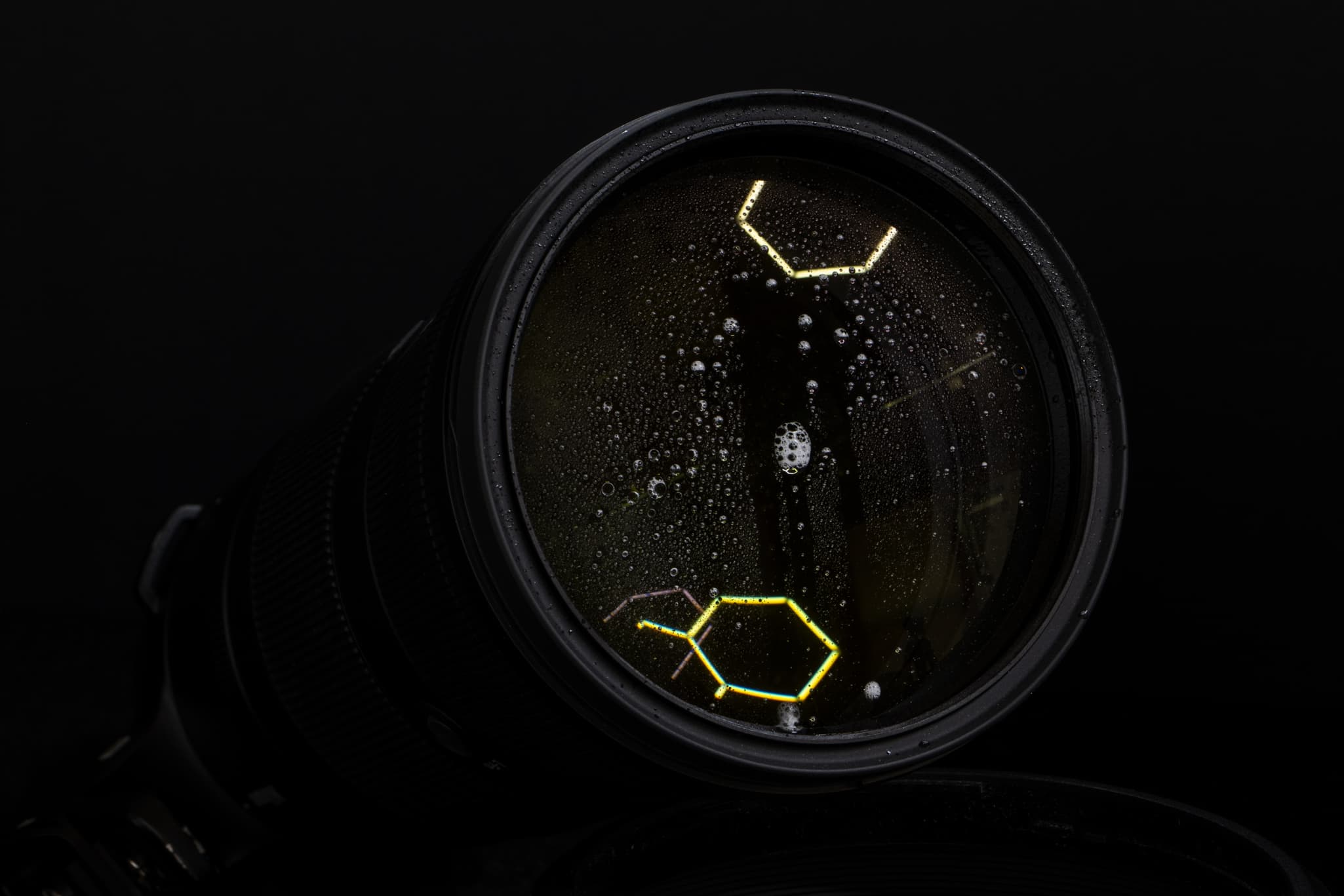 Highlighting light water droplets shedding off the fluorine-coated Nikon Z 180-600mm f/5.6-6.3 VR