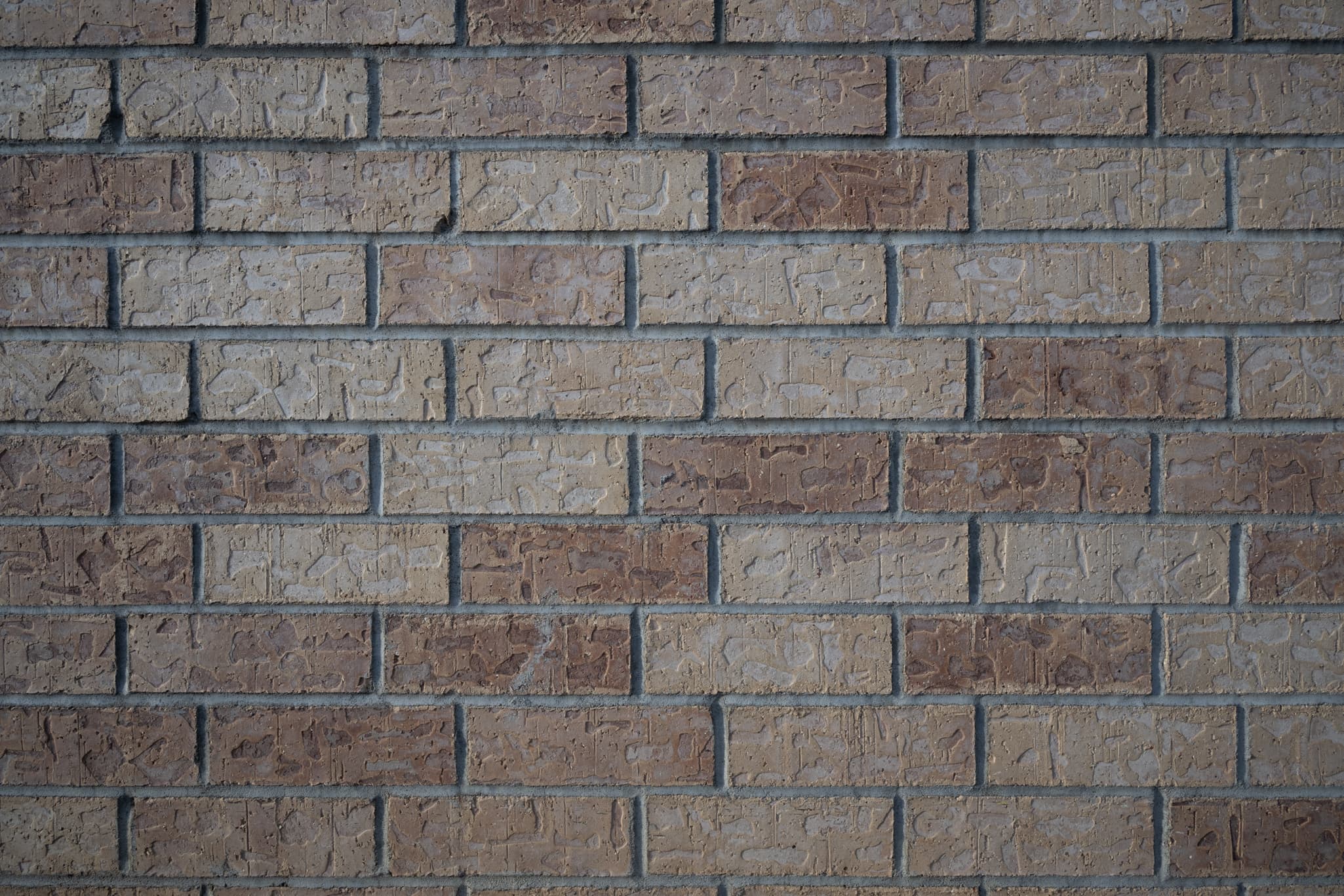 Flat, square-on tripod image facing a uniform brick wall at 24mm f/8 on the Nikon Z 24-120mm f/4 S: one raw uncorrected frame to evaluate native barrel distortion, and one with in-camera profile corrections applied