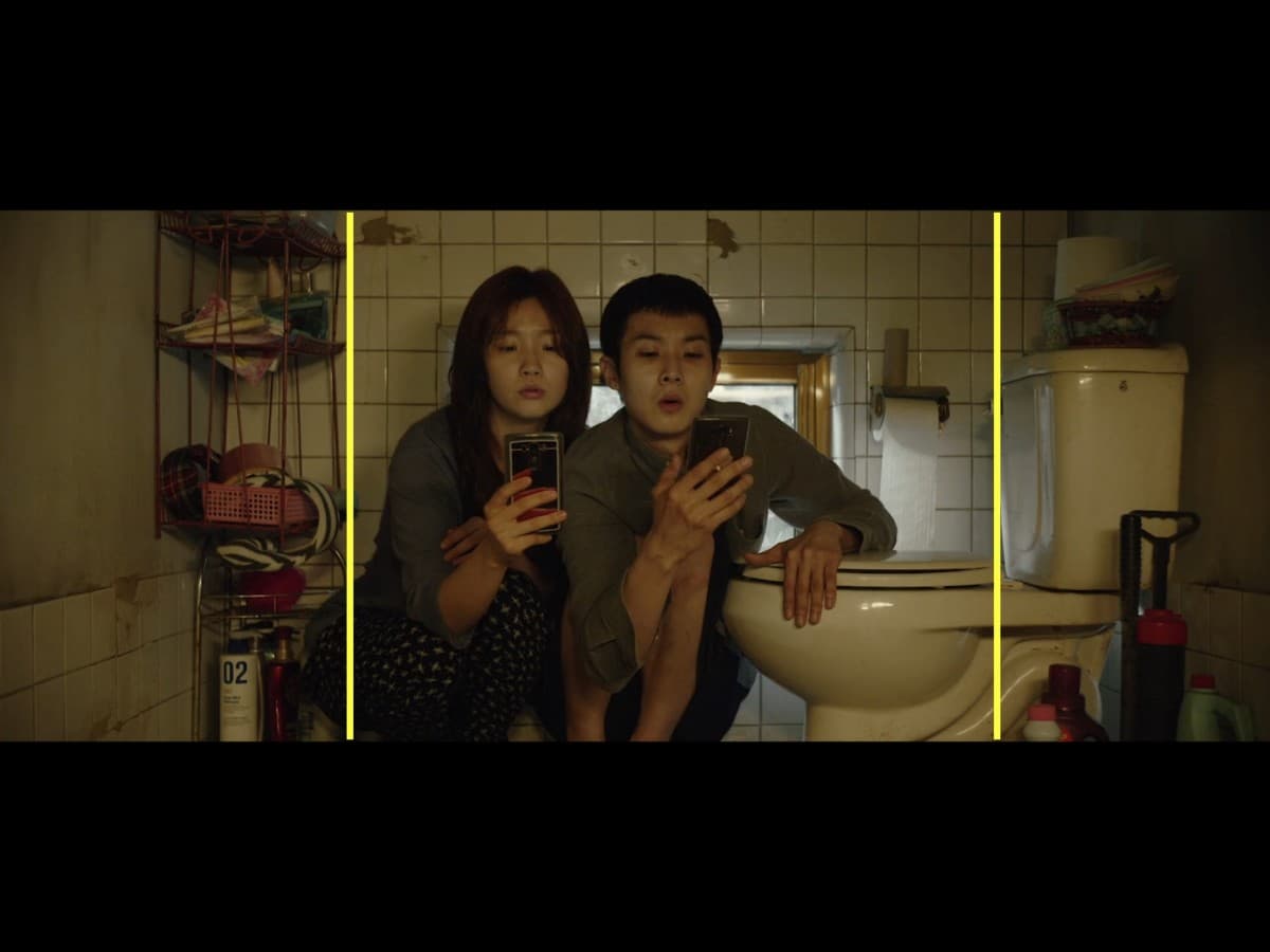 Composition from scene from Parasite where Ki-woo and sister are in bathroom.