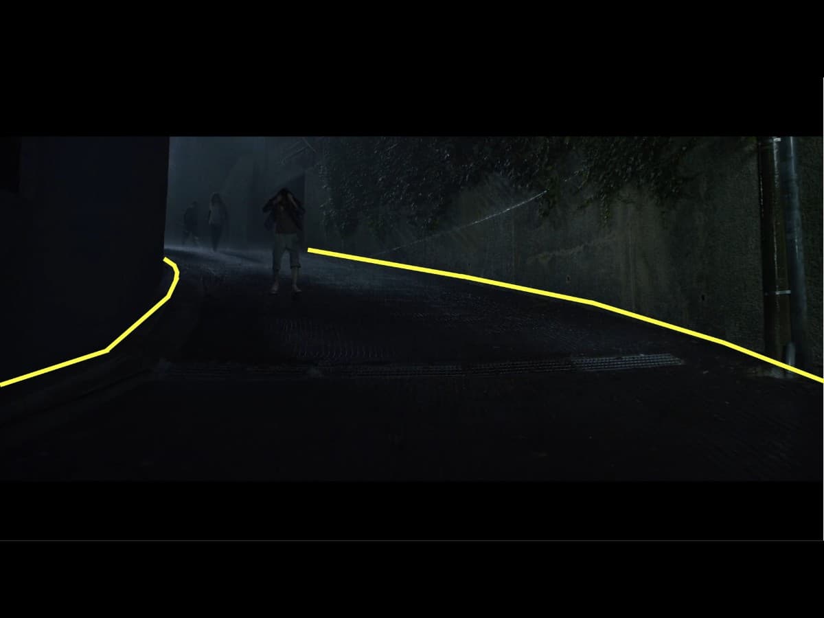 Composition from scene in parasite where Kim family is running down alley in rain.