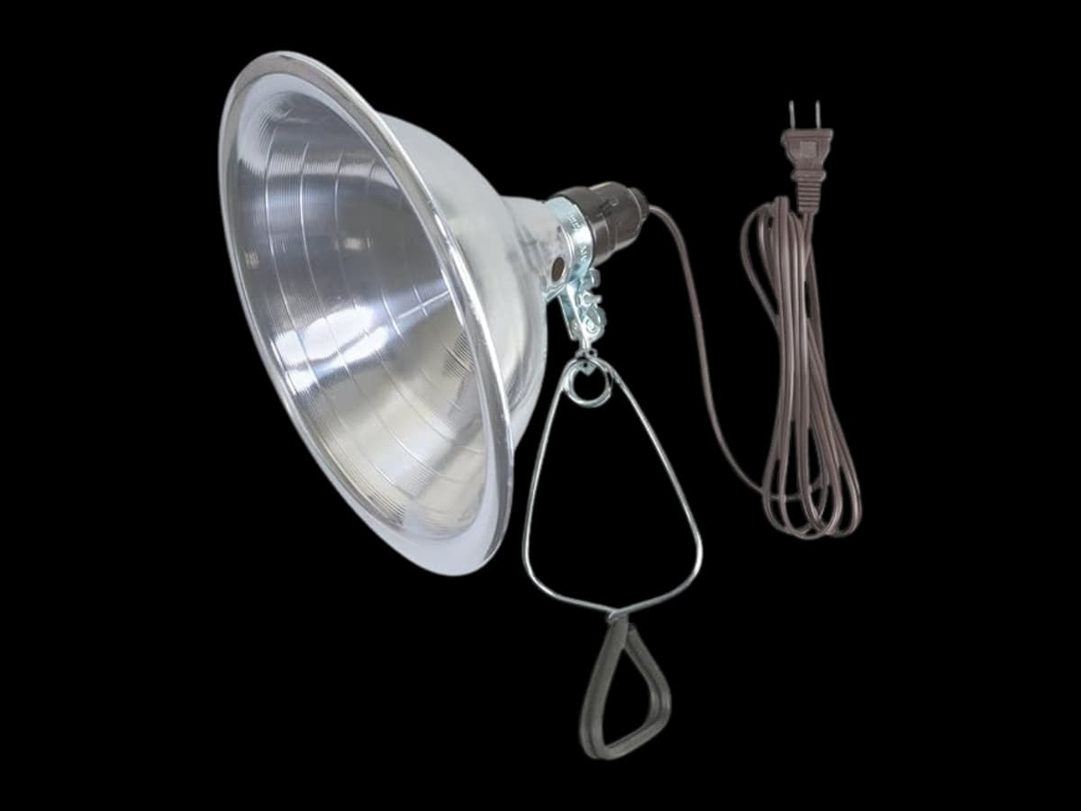 A reflector lamp on black background.