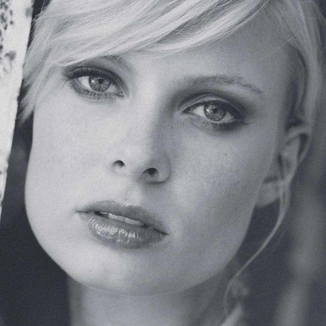 Woman looking at camera.
