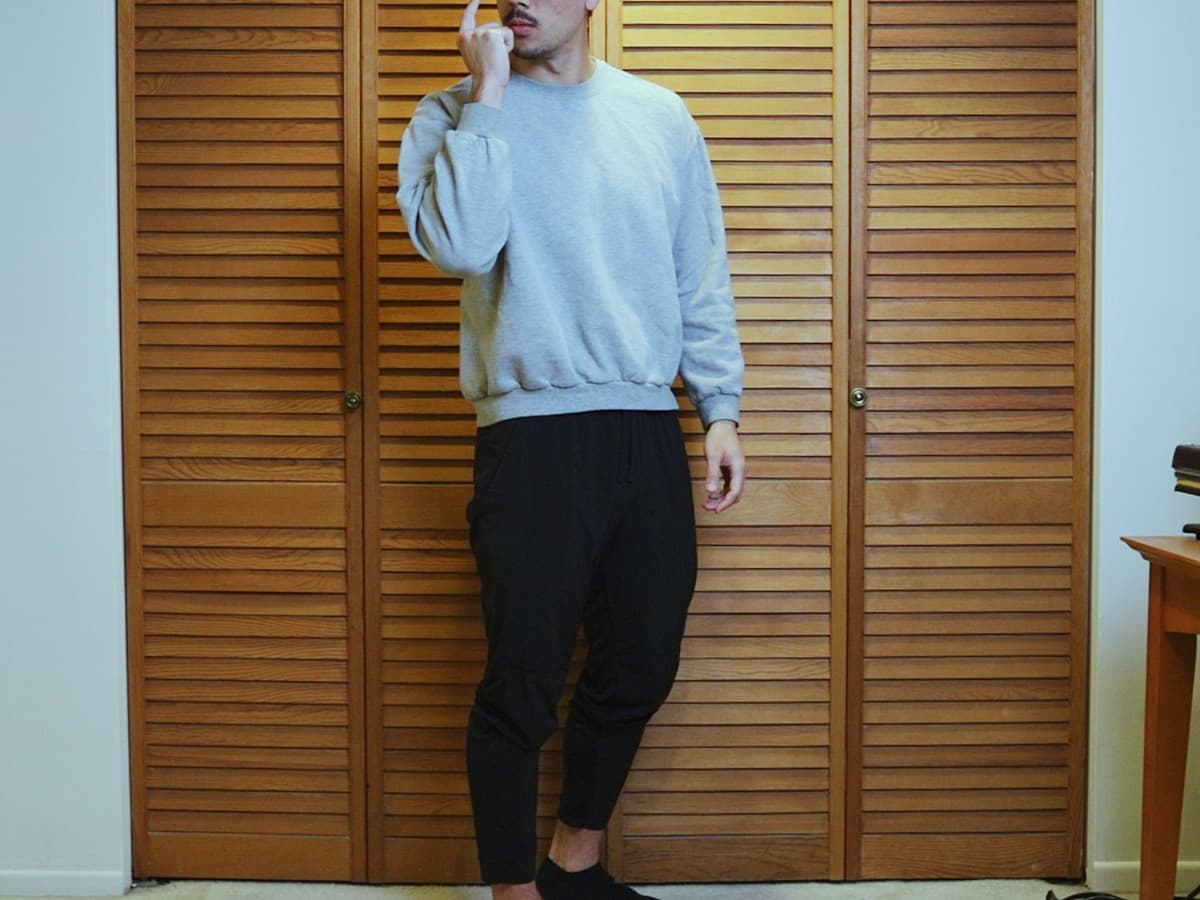 Man posing by turning and tilting his head.