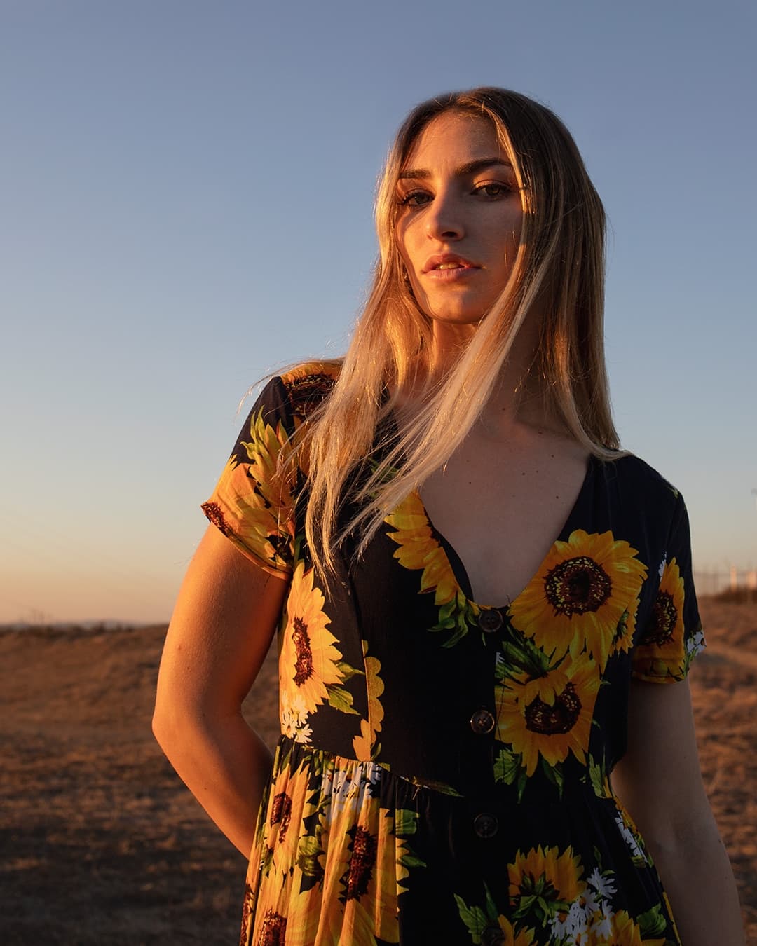 Beginning of Golden Hour portrait Girl wearing flower dress at the beginning of golden hour.
