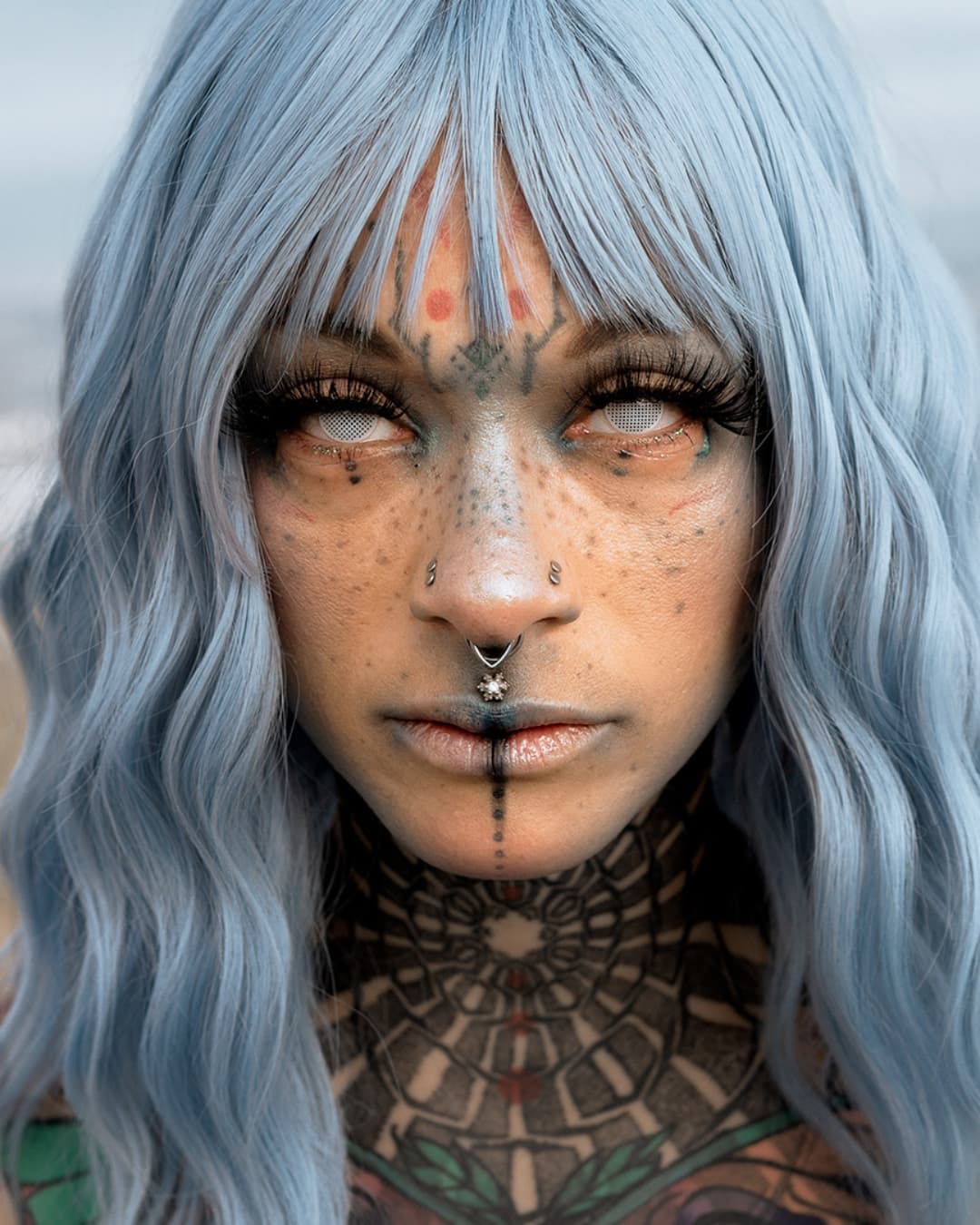 Can see sharpness in the skin texture and pores Woman with tattoos and wig in a sharp photo.
