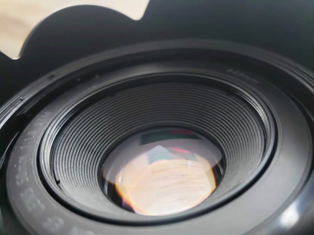 Check for dust or smudge on lens Lens with dust and smudge on it.