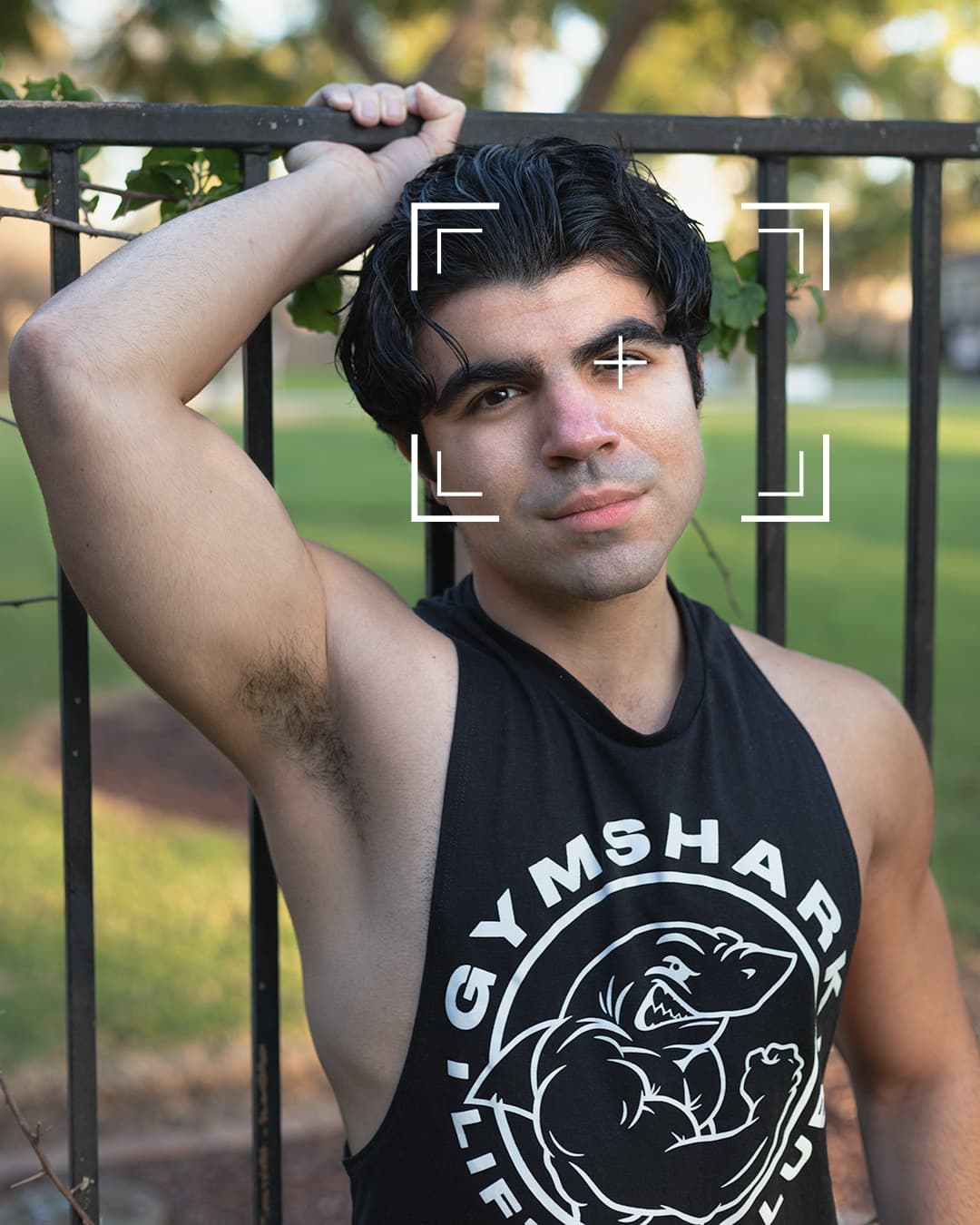 Focus point on eye for sharp portraits Man against gate with a focus point on his eyes.