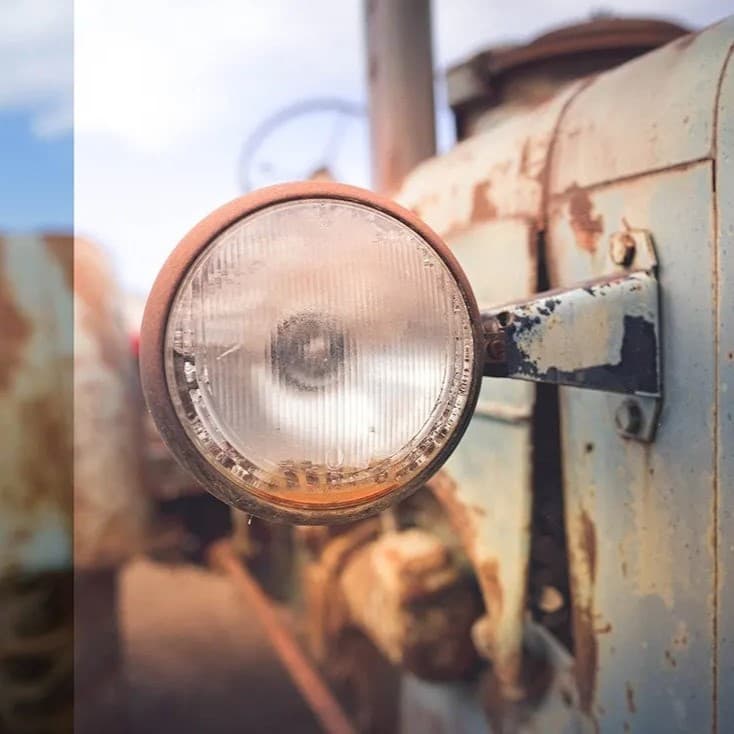 Headlight on an old car.