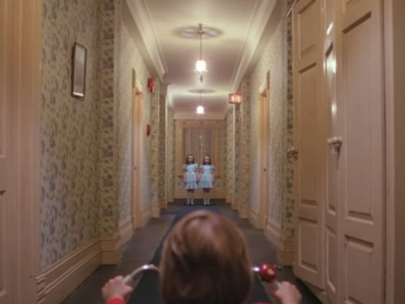 Leading lines in The Shining Scene from The Shining with leading lines of the hallways.