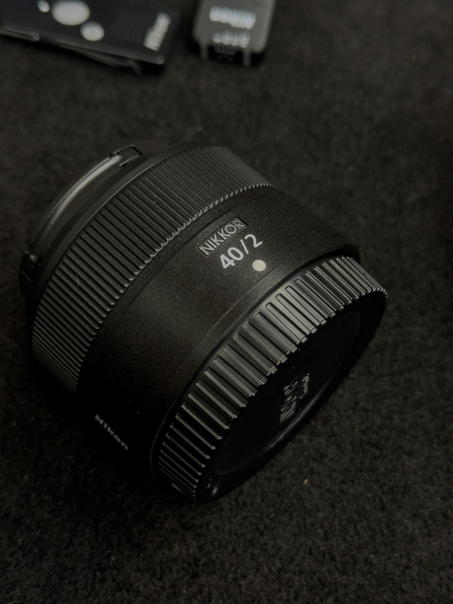 Highlighting lightweight, all-polycarbonate plastic construction of the Nikon Z 40mm f/2