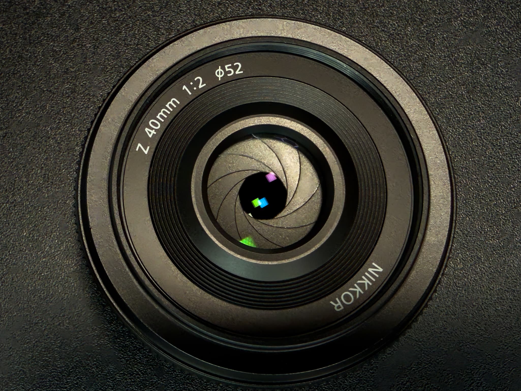Angled shot of the Nikon Z 40mm f/2 showcasing Super Integrated Coating