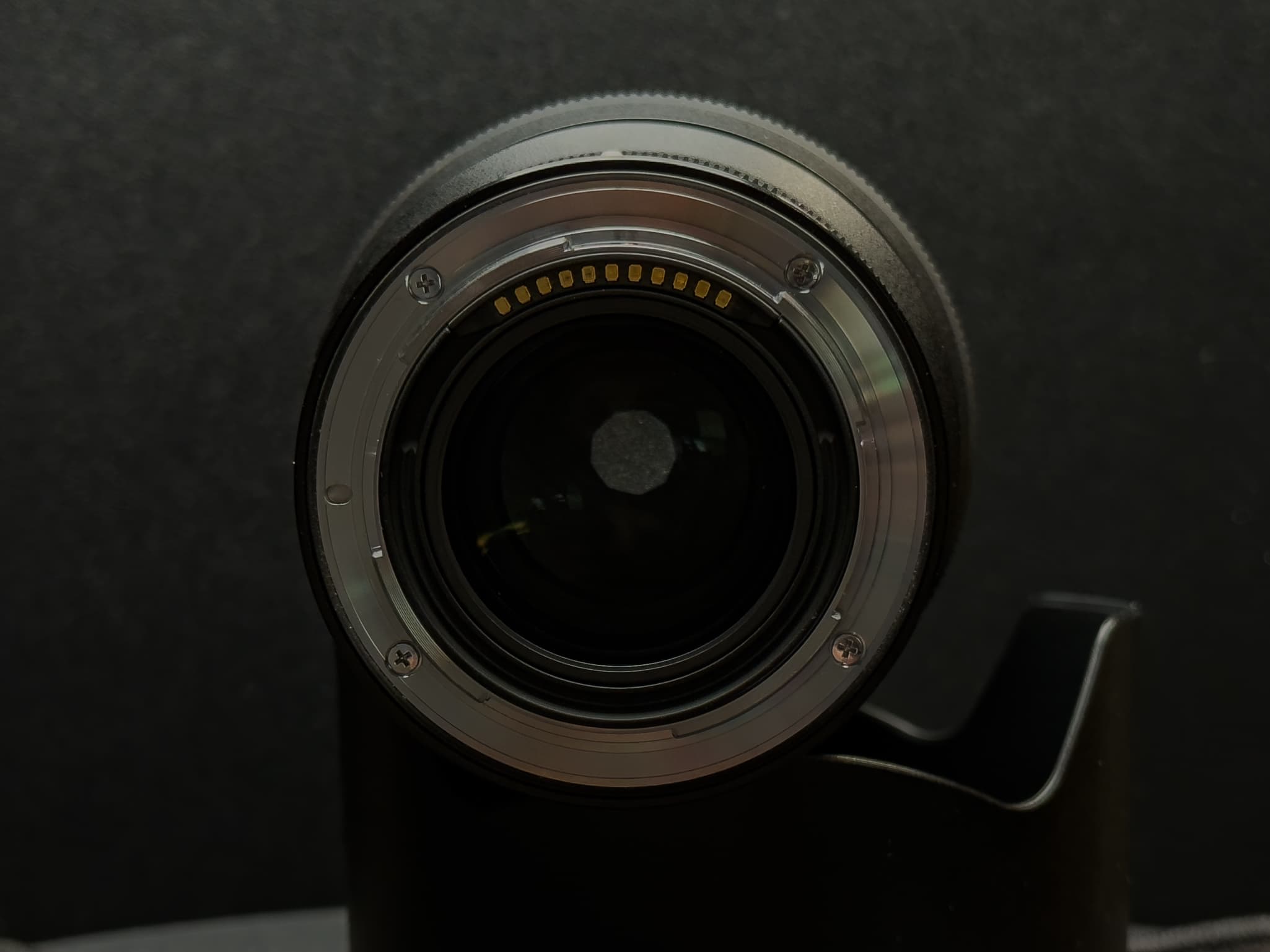 Close-up of the metal Z-mount flange face, focusing on the pristine gold electronic communication pins.