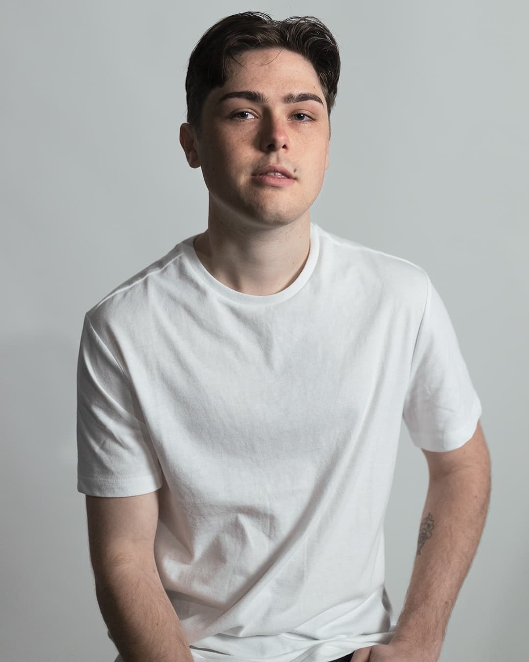 Soft light portrait using softbox and studio light Soft light portrait of guy in studio using softbox and studio light.