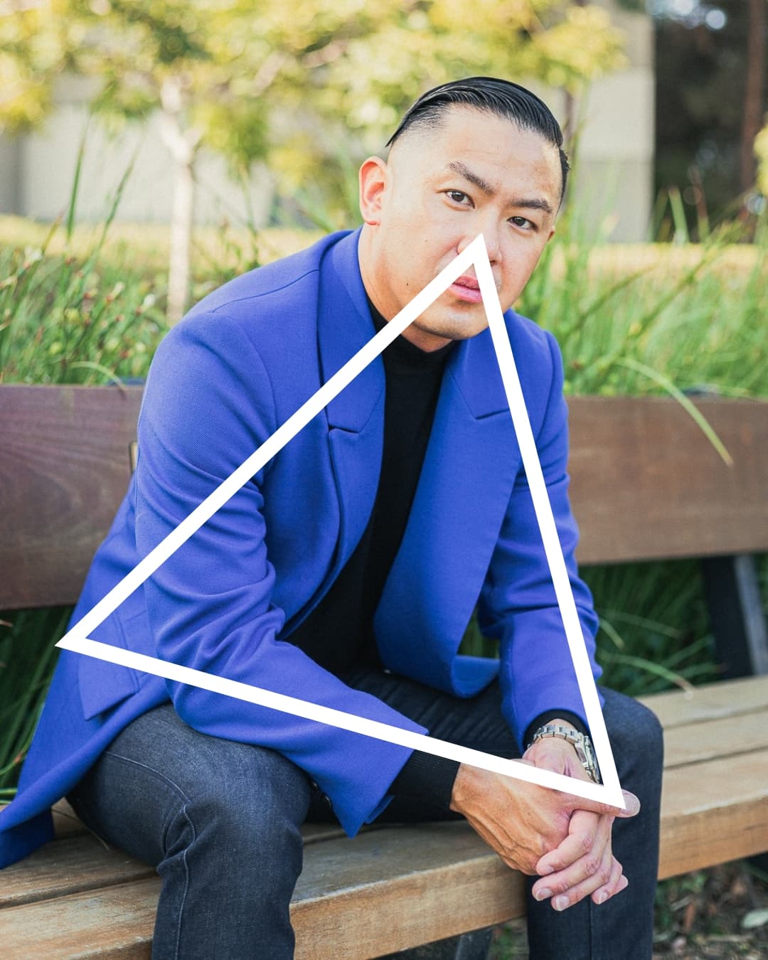 Adding triangle Man in blue suit sitting on bench in a triangle pose.